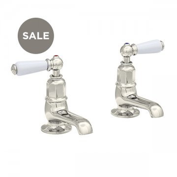 Pillar basin tap set with white porcelain levers