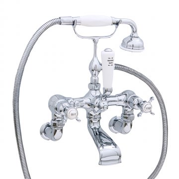 Bath/shower mixer on wall unions with crossheads and a handshower in a cradle