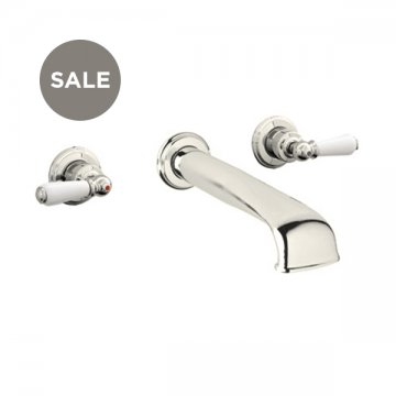 Wall-mounted basin mixer with low spout & white porcelain lever taps