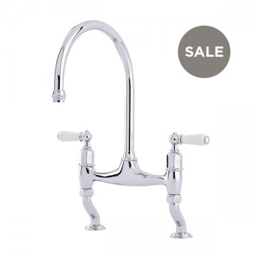 Ionian 2 hole bench mounted sink mixer with offset legs & white porcelain lever taps