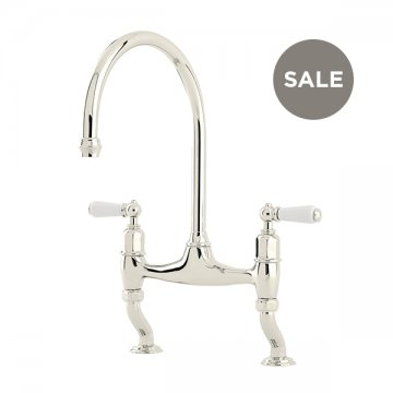 Ionian 2 hole bench mounted sink mixer with offset legs & white porcelain lever taps