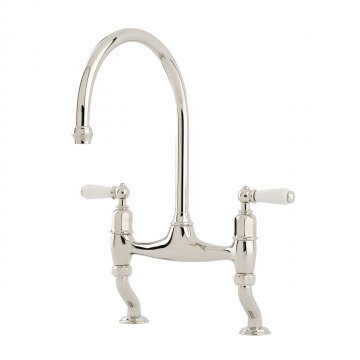 Ionian 2 hole bench mounted sink mixer with offset legs & white porcelain lever taps