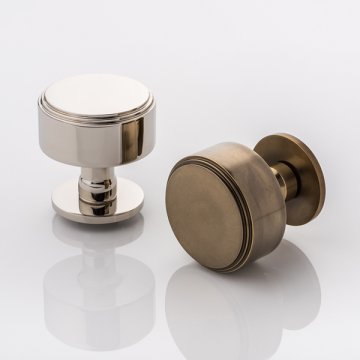Bartlett solid brass door knob with round rose