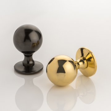 Durham solid brass door knob with tapered rose