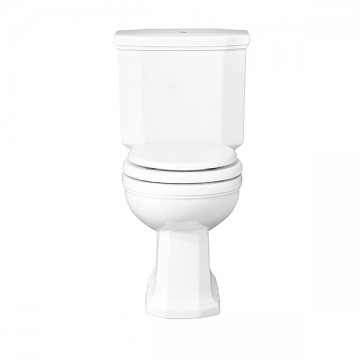 Close-coupled toilet including cistern and pan.