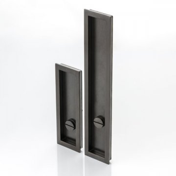 Rectangular solid brass recessed pull with privacy turn/release
