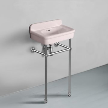 Rockwell Cloakroom Basin 480w x 300d in Pale Pink on basin stand. Zero, one or two tap holes.