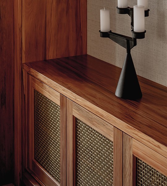 Native timber joinery inset with best handwoven brass decorative grilles from Oxford Grilles.