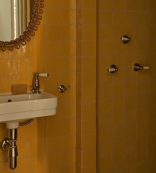 Best traditional porcelain bathroom basin taps and mini basin from The Water Monopoly in contemporary bathroom setting.