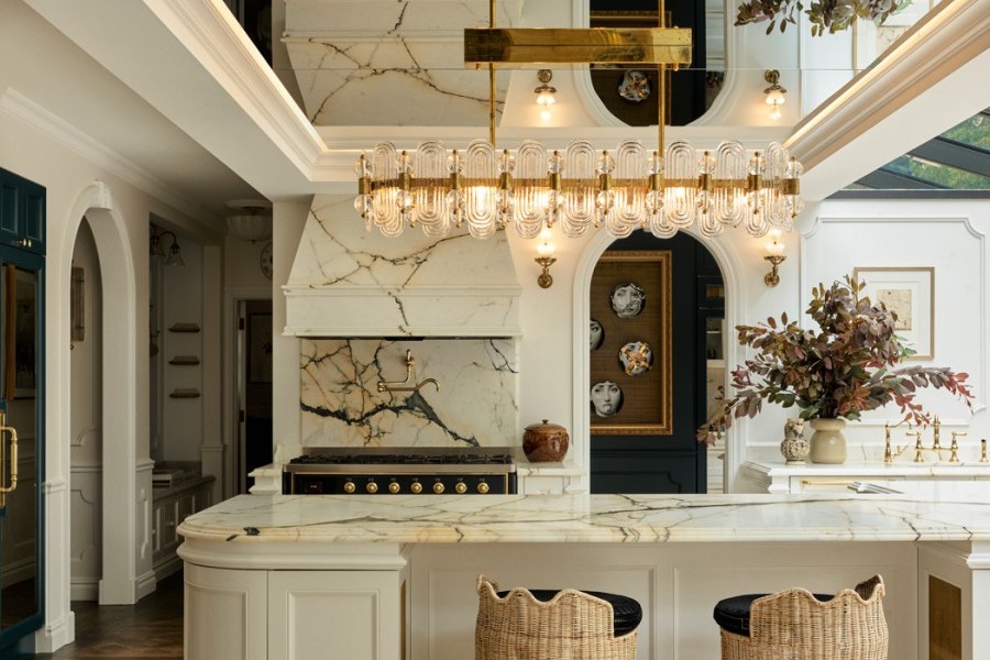Romney House kitchen at Amberlane Estate featuring natural materials, handcrafted cabinetry, and Perrin & Rowe Country polished brass tapware and pot filler, with polished brass Latchford cabinet pulls.
