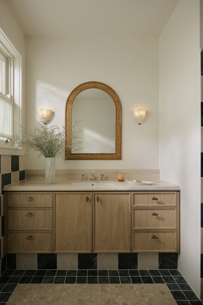 Green checkerboard tiles and timber vanity with Armac Martin brass t-bar handles and traditional hot and cold nickel taps from Perrin & Rowe. 