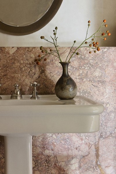 A marble bathroom with pedestal sink from The English Tapware Company and Polished Nickel heritage Perrin & Rowe basin mixer and taps.