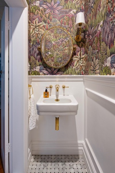 Soho 500mm wide traditional style wall mounted powder room basin and polished brass basin taps in elegant powder room.
