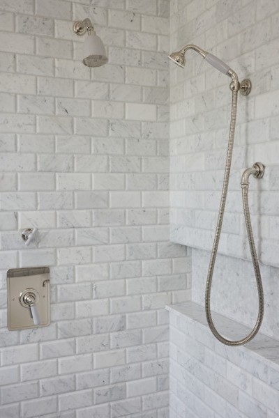 Guest ensuites featuring polished nickel tapware with Rockwell finishes, including Seattle Grey and Willow Green, creating cohesive yet distinctive bathroom designs.