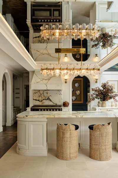 Romney House kitchen at Amberlane Estate featuring natural materials, handcrafted cabinetry, and Perrin & Rowe Country polished brass tapware and pot filler, with polished brass Latchford cabinet pulls.
