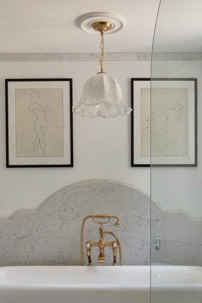 Main bathroom with Perrin & Rowe floor-standing bath mixer, matching shower with 200mm rose, and Paris freestanding bath by The Water Monopoly, creating a serene and luxurious space.