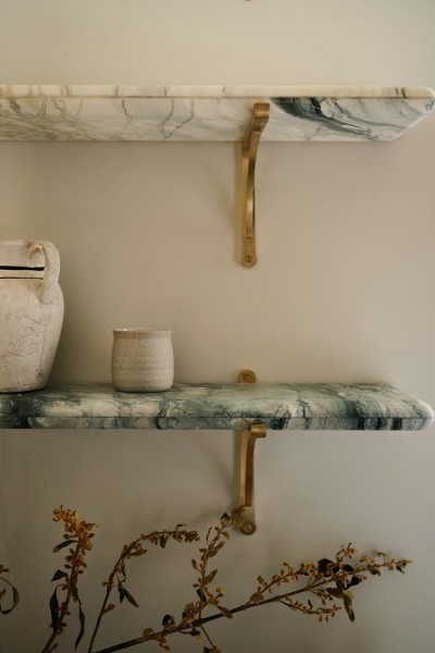 Heritage-style kitchen in Warrnambool with marble benchtops, Perrin & Rowe tapware, handcrafted joinery, and citrus-accented walls and tiles.