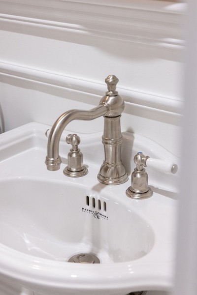 The best of British tapware in Brushed Nickel with white Porcelain handles