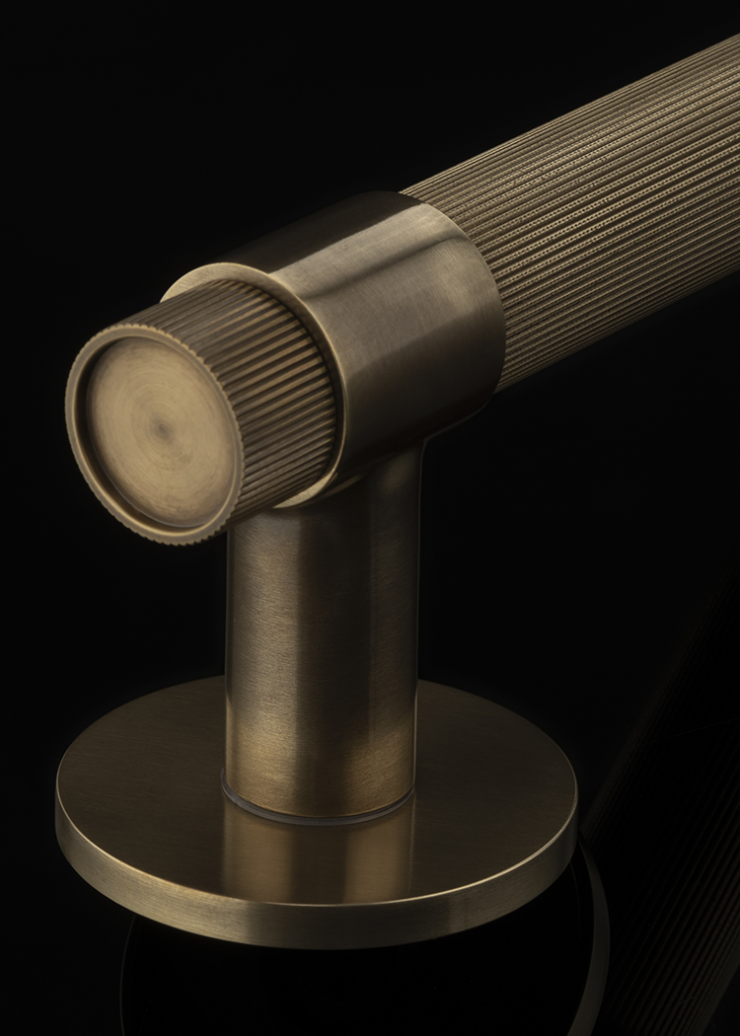 Linear knurled door lever hardware available in Australia from Joseph Giles in the UK