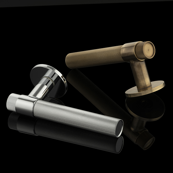 Architecturally premium hardware - beautiful door lever handles with knurled lines and smooth detailing from Joseph Giles. 