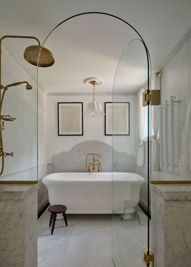 Brass heritage style floor mounted bath tap in architecturally designed residences