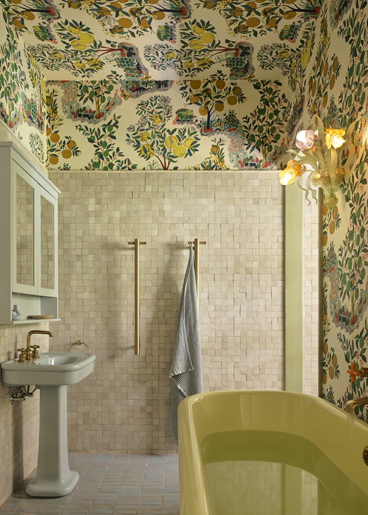 Bathroom by YSG interior design showing Green basin on pedestal with yellow bath too.