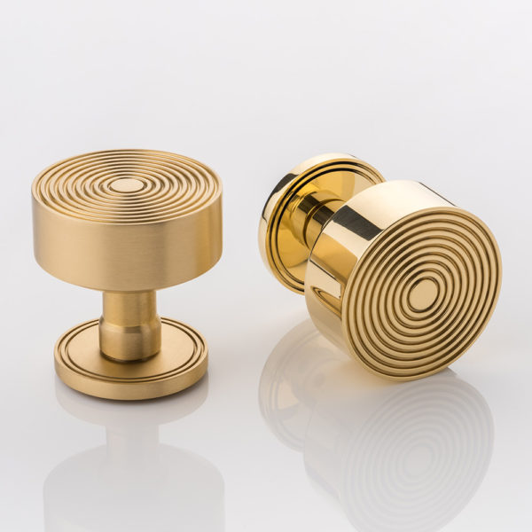 Fowler II solid brass door knob with grooved rose
