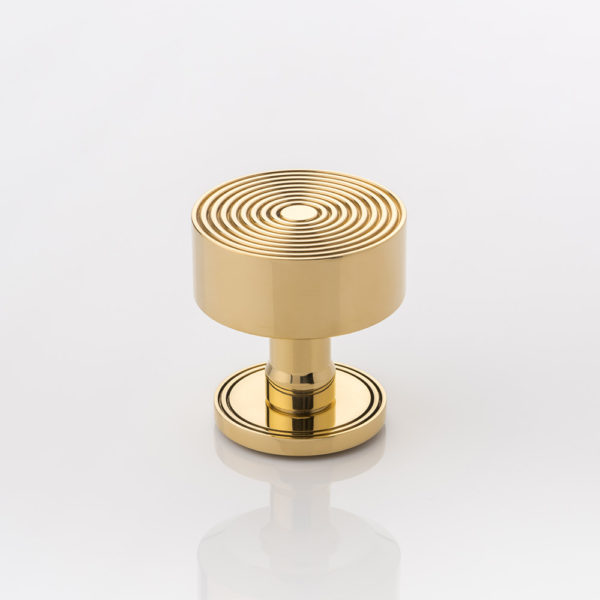 Fowler II solid brass door knob with grooved rose