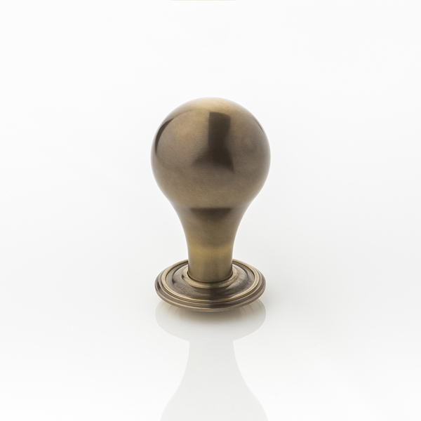 Roland II solid brass door knob with ornate rose