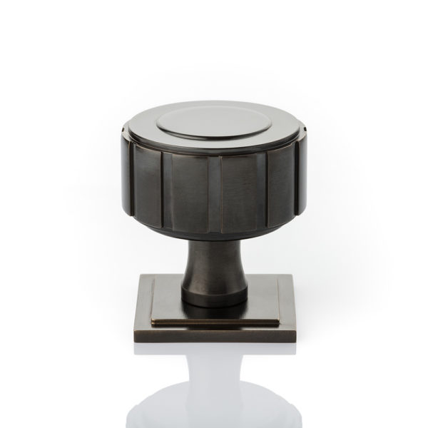 Boyle solid brass door knob with square stepped rose