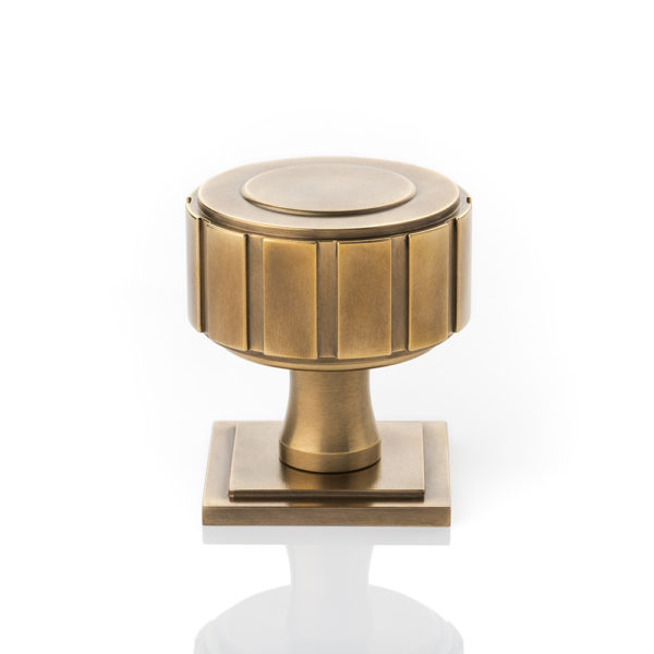 Boyle solid brass door knob with square stepped rose