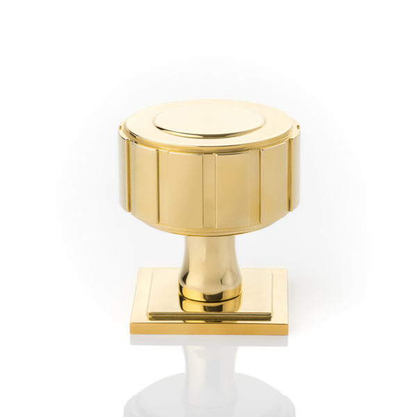 Boyle solid brass door knob with square stepped rose
