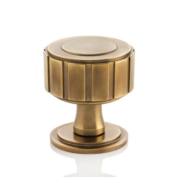 Boyle solid brass door knob with round stepped rose