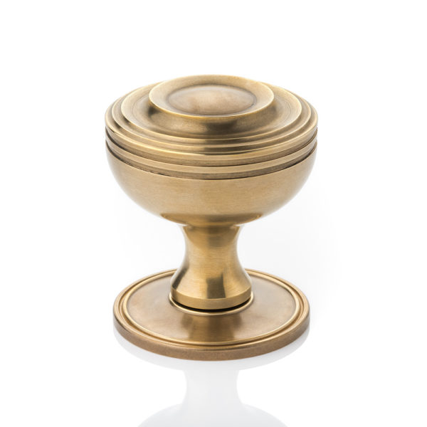 Benedetto solid brass door knob with ridged rose