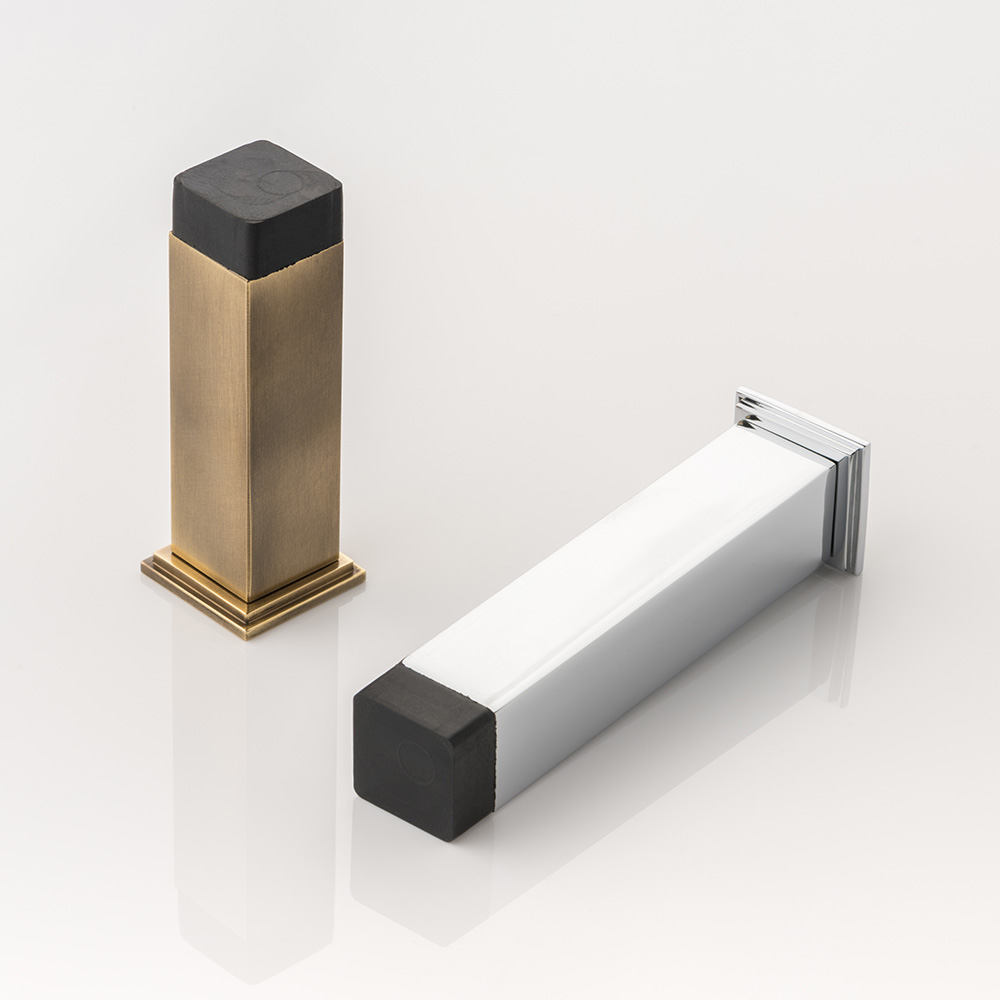 Cube solid brass wall-mounted door stopper with decorative stepped plate 