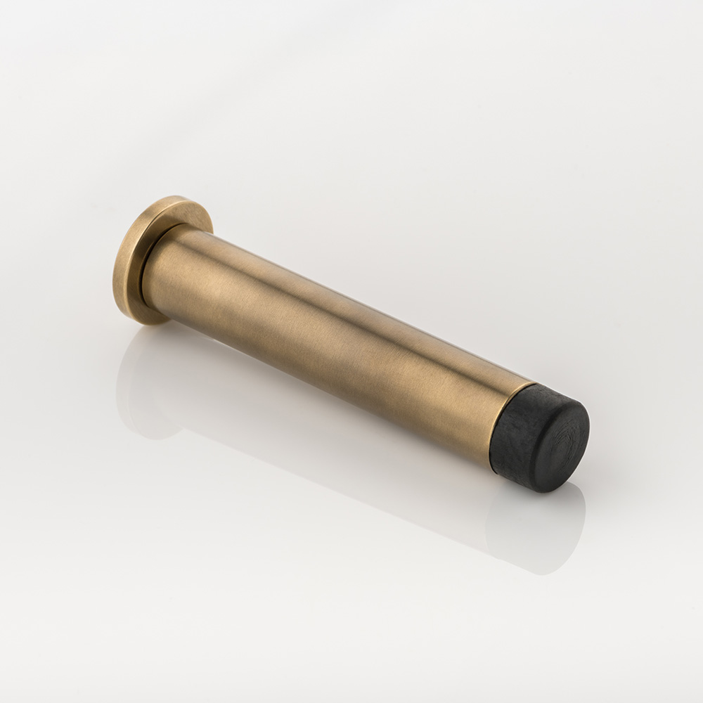 Round solid brass wall-mounted door stopper with stepped plate