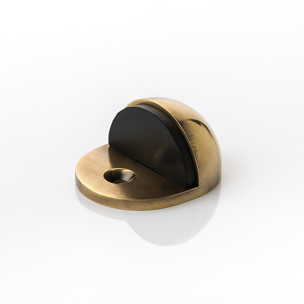 Solid brass floor mounted domed door stopper