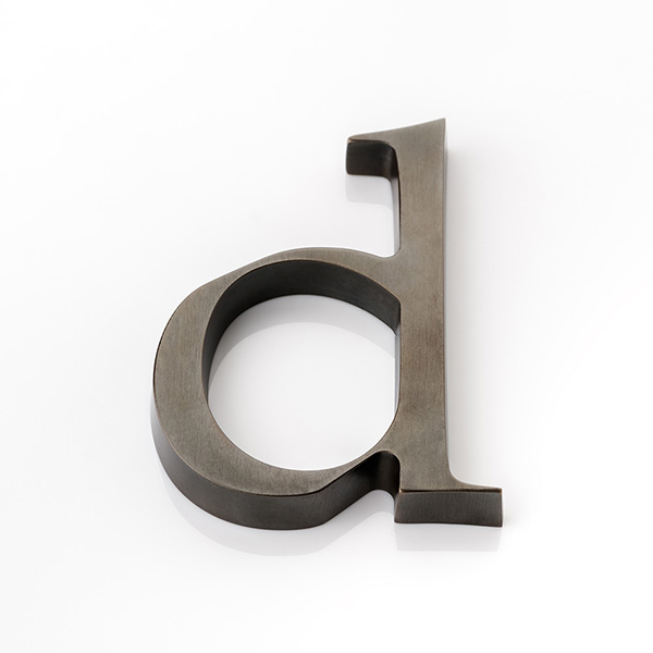 Solid brass door letter (d)