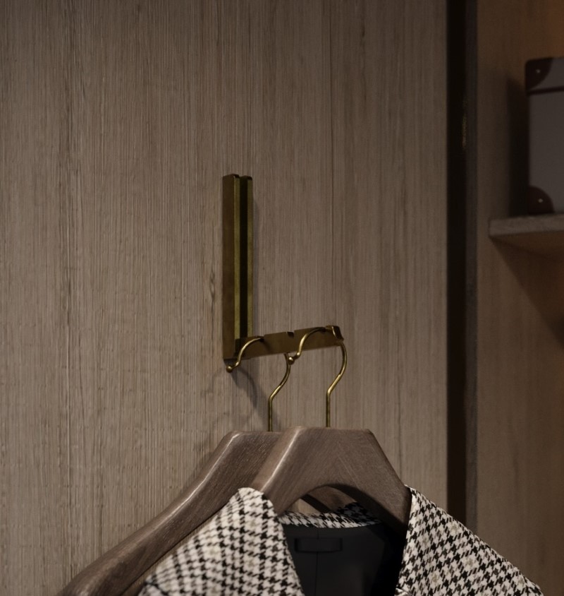 Folding garment rail