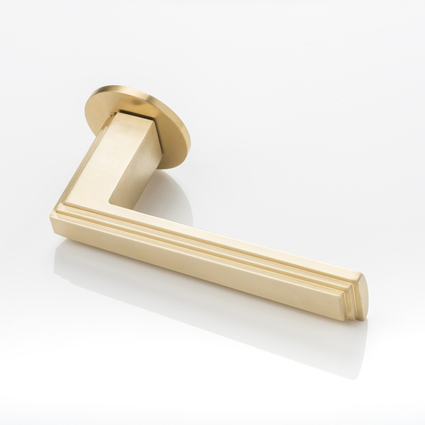 Dewhurst III solid brass door lever handle with round rose