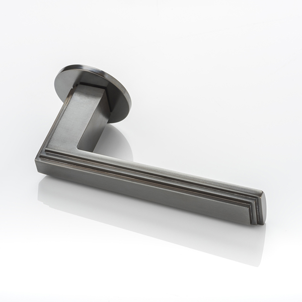 Dewhurst III solid brass door lever handle with round rose