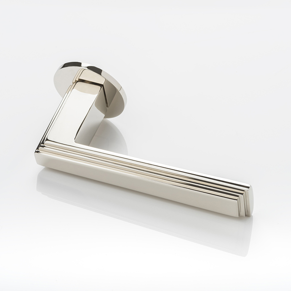 Dewhurst III solid brass door lever handle with round rose