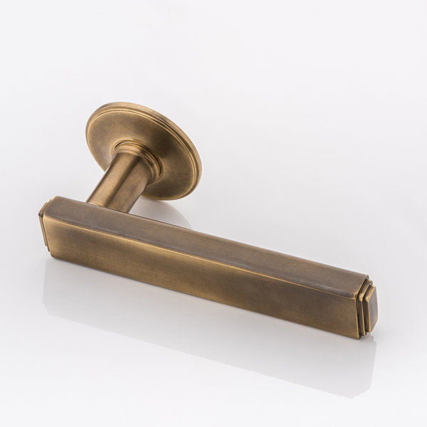 Doyle solid brass door lever handle with traditional rose
