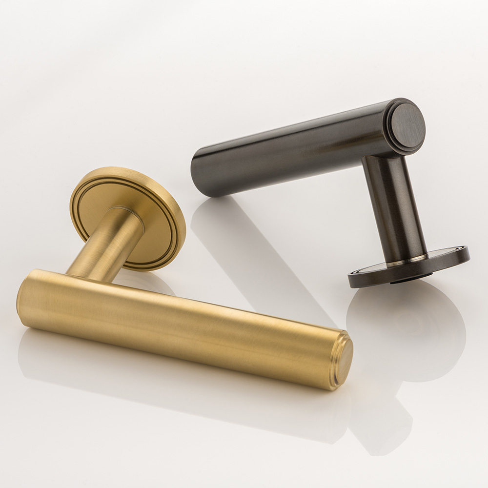 Bartlett II solid brass door lever handle with grooved rose