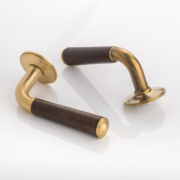 Darlington i solid brass door lever handle with hand stitched leather & traditional rose