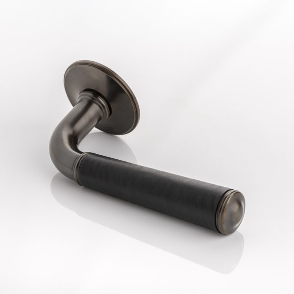Darlington i solid brass door lever handle with hand stitched leather & traditional rose
