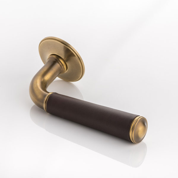 Darlington i solid brass door lever handle with hand stitched leather & traditional rose