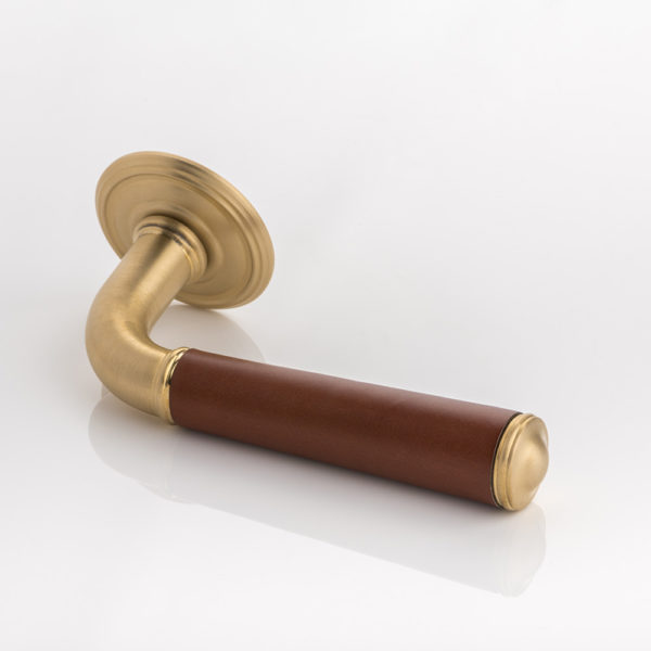 Darlington II solid brass door lever handle with hand stitched leather & ornate rose