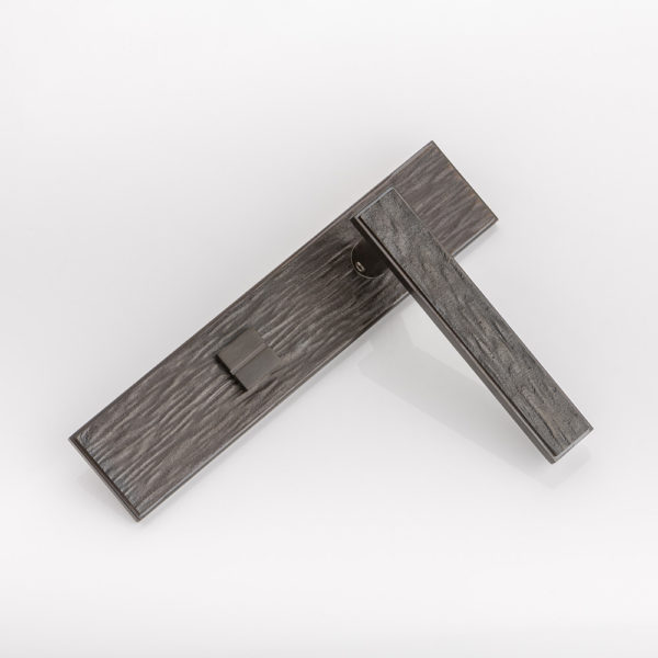 Molten texture solid bronze door lever handle with privacy backplate