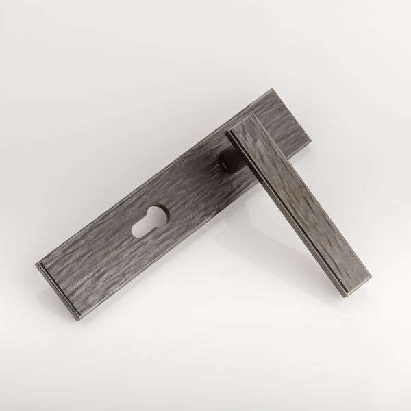 Molten texture solid bronze door lever handle with euro cut out backplate